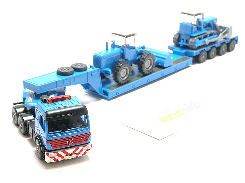 Mercedes-Benz SK 2444 S low-loader w. heavy machinery load blue